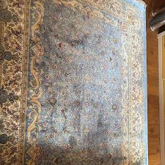 Photo publiée par le client : un tapis à fond bleu clair