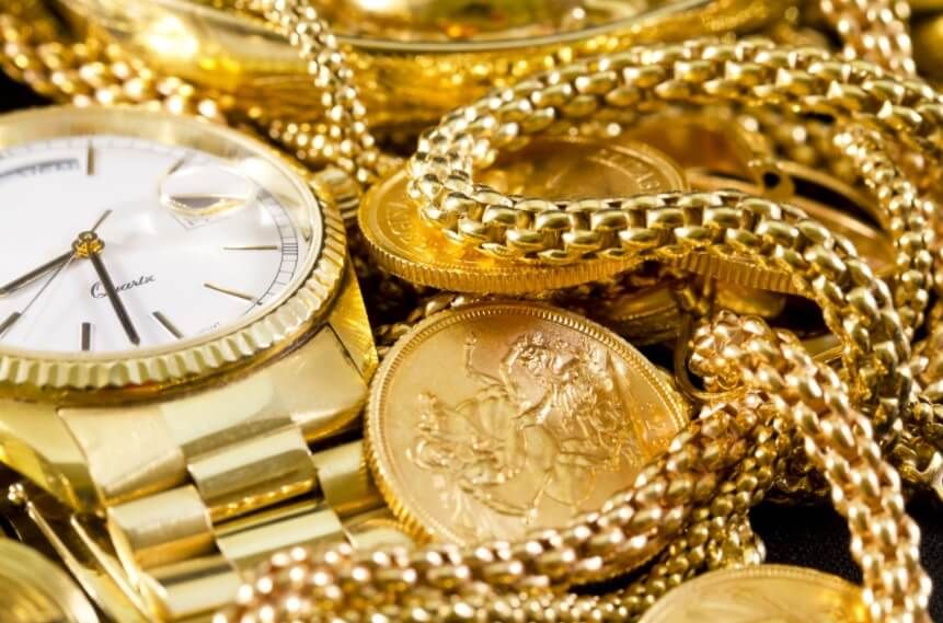 Gold jewellery, gold coins and a gold watch